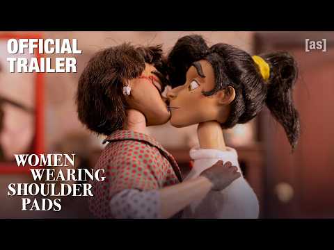 Trailer Women Wearing Shoulder Pads (Mujeres con hombreras)